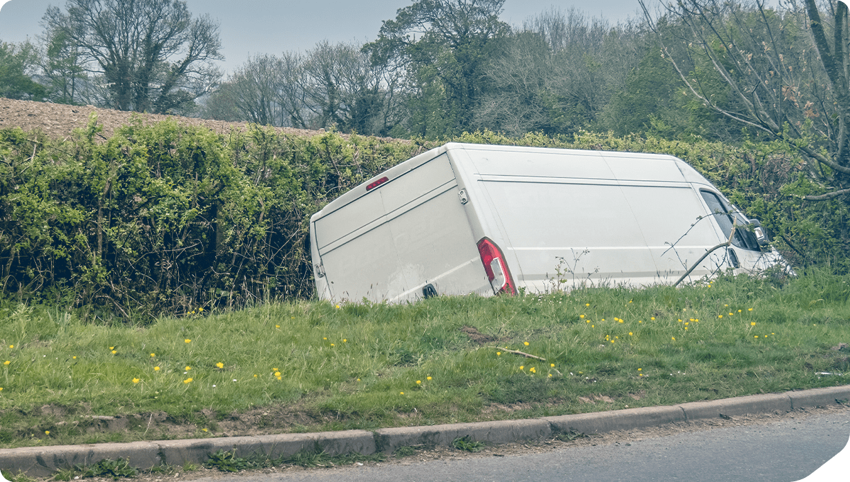 White van in a ditch 